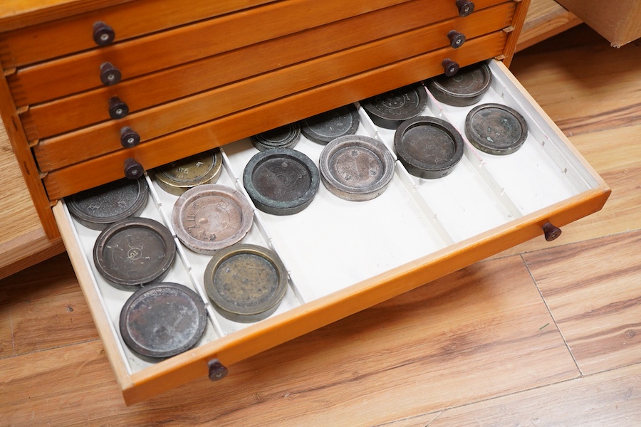 A collection of mainly Medieval to 19th century bronze and lead imperial circular trade weights, with a few Roman and later examples, stamped with Royal Cyphers, weights, the dagger assay mark for London, other proof mar